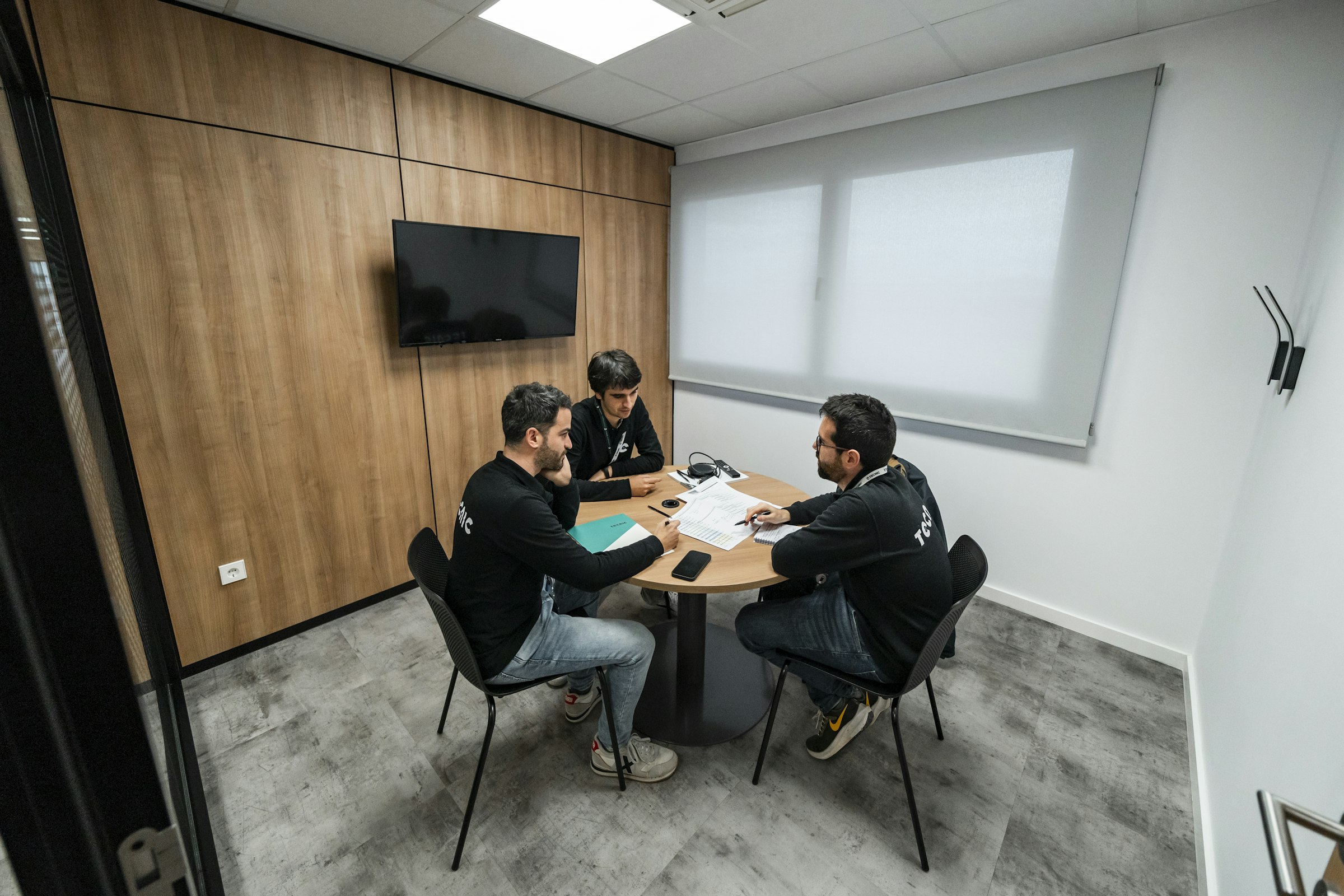 Operations team reviewing claims data in a meeting room